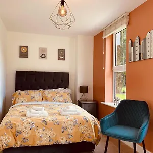  Holiday home Cheerful 2-bed Townhouse In With Parking